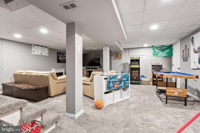 playroom with a paneled ceiling, recessed lighting, visible vents, carpet flooring, and baseboards