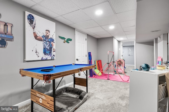 game room featuring carpet floors, a drop ceiling, and baseboards