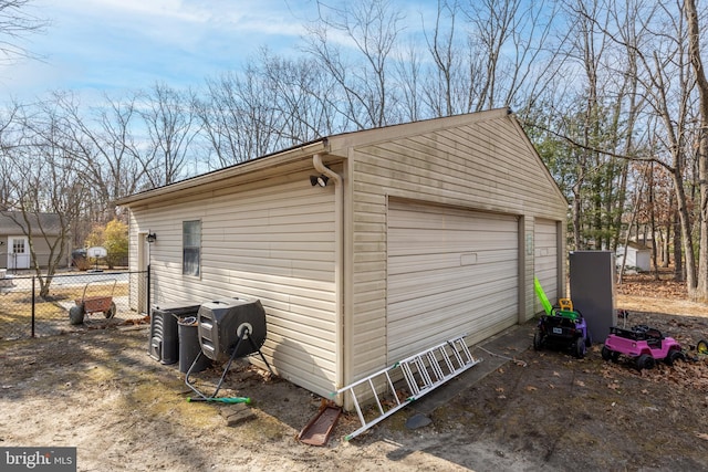 detached garage with fence