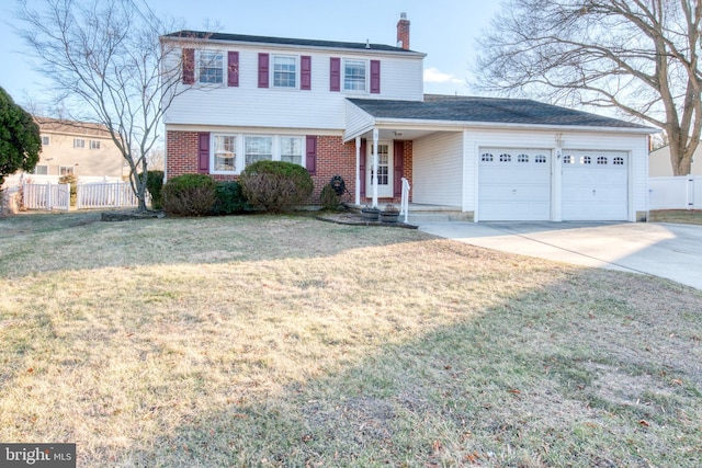 view of front of house with a garage, fence, concrete driveway, a chimney, and a front yard