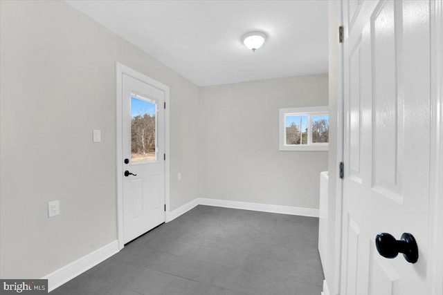 entryway with a healthy amount of sunlight and baseboards