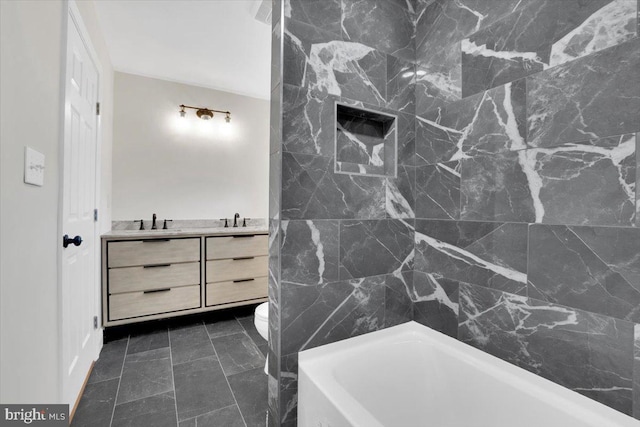 bathroom with vanity and toilet