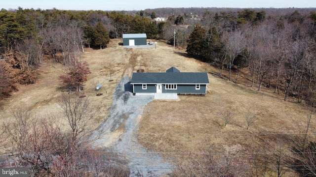 aerial view featuring a view of trees