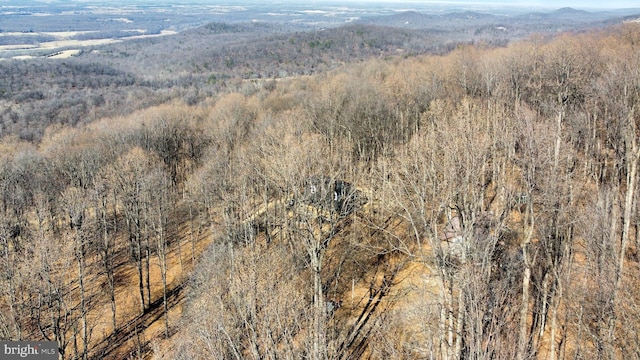 drone / aerial view with a view of trees