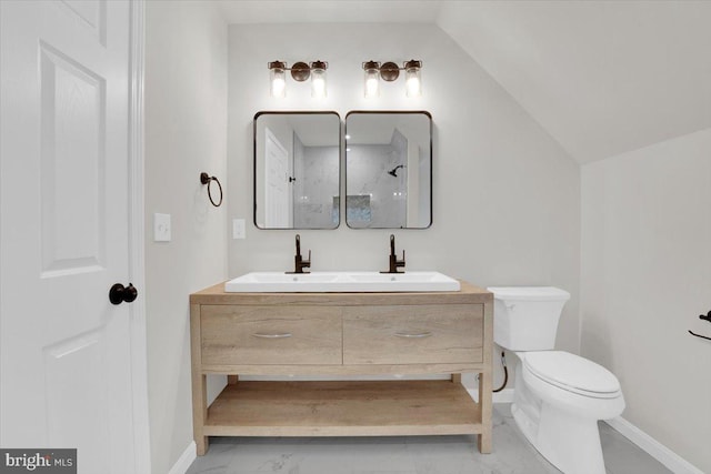 full bath with lofted ceiling, vanity, toilet, and walk in shower