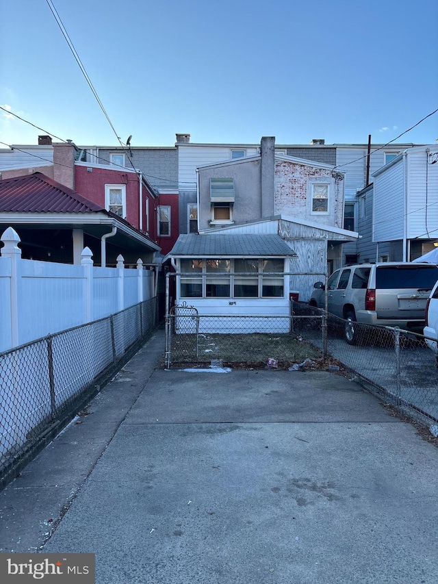 back of property with fence private yard