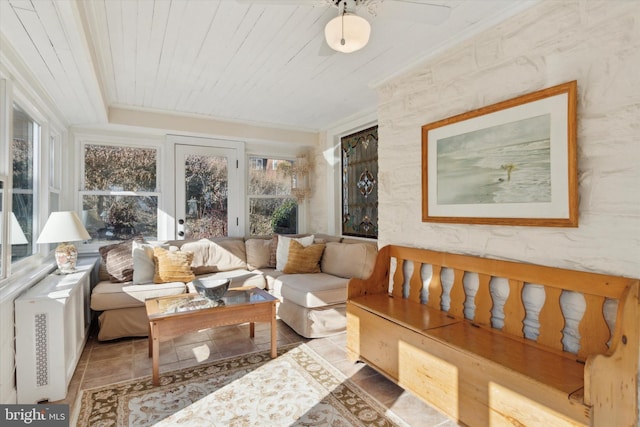 sunroom with wood ceiling and radiator heating unit