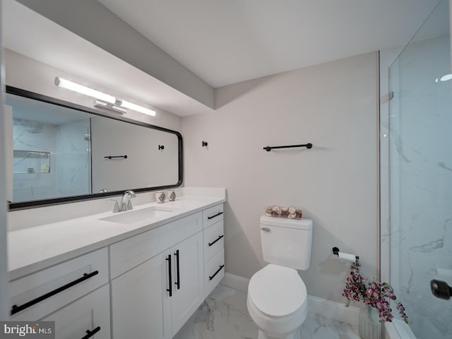 bathroom featuring a marble finish shower, baseboards, toilet, marble finish floor, and vanity