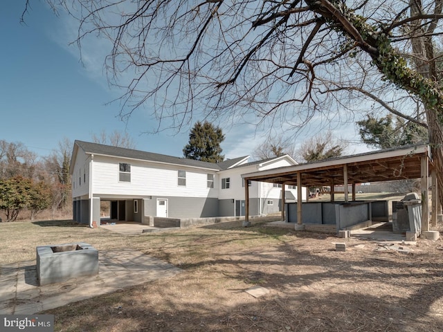 back of property featuring a patio