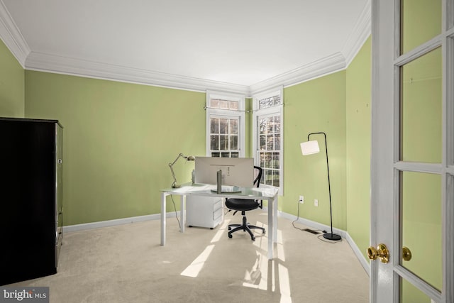 carpeted office with crown molding and baseboards