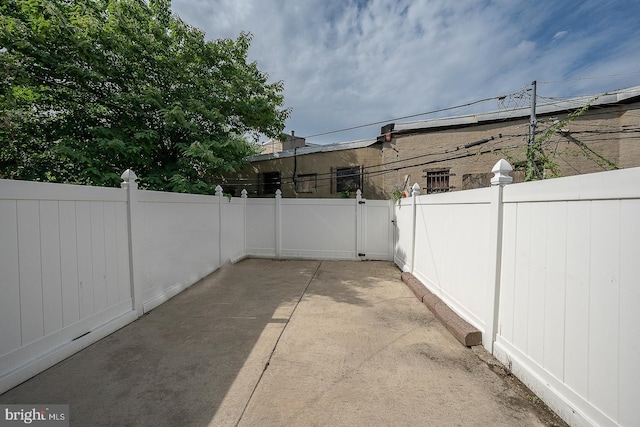 view of patio with fence