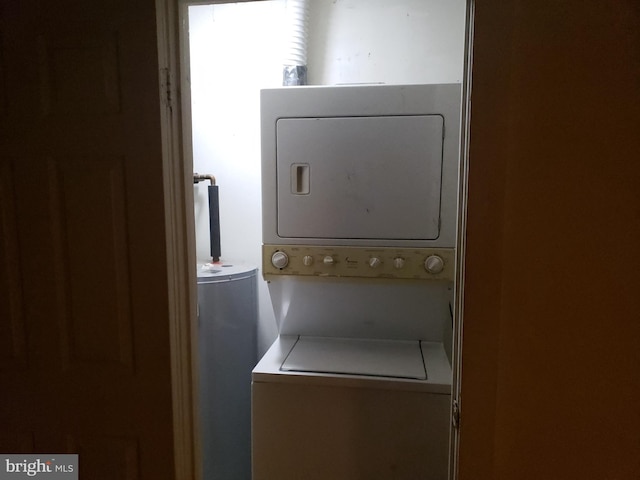 washroom with laundry area and stacked washer and clothes dryer