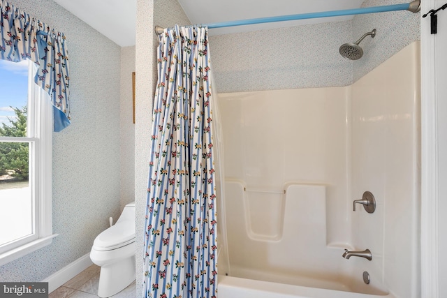 bathroom with toilet, tile patterned flooring, and shower / tub combo with curtain