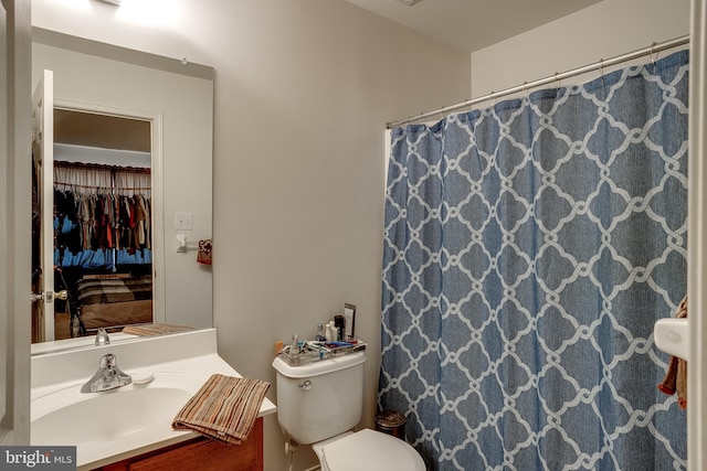 full bath with vanity and toilet