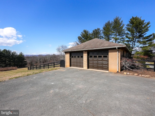 detached garage with fence