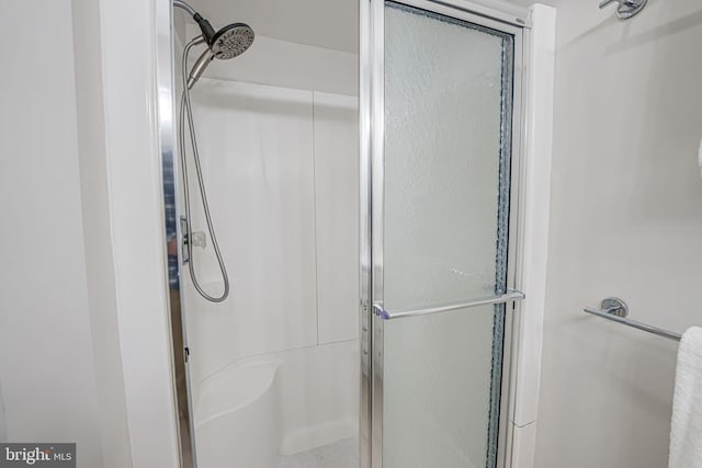 full bath featuring a stall shower