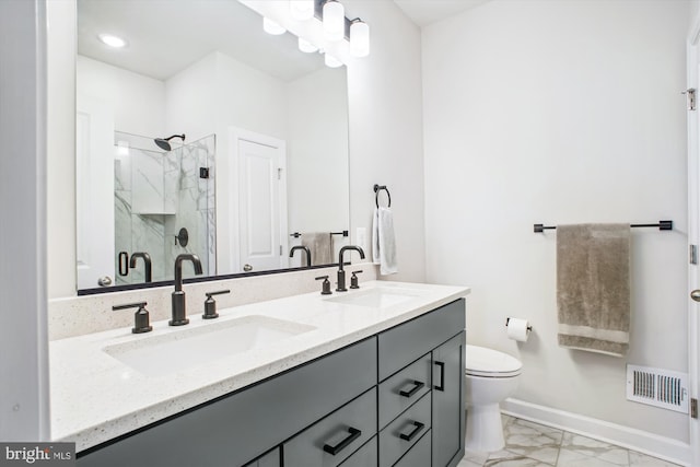 full bathroom with marble finish floor, a marble finish shower, visible vents, and a sink