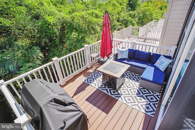 deck featuring an outdoor hangout area