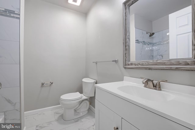 full bathroom featuring toilet, vanity, baseboards, marble finish floor, and a shower