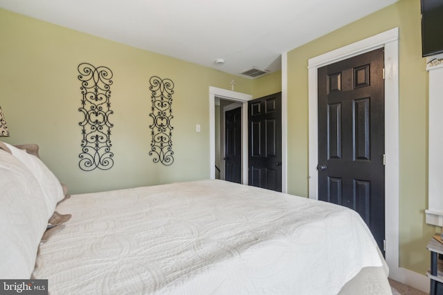 bedroom with visible vents