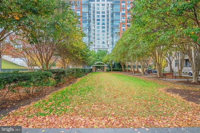 view of property's community with a gazebo and a yard