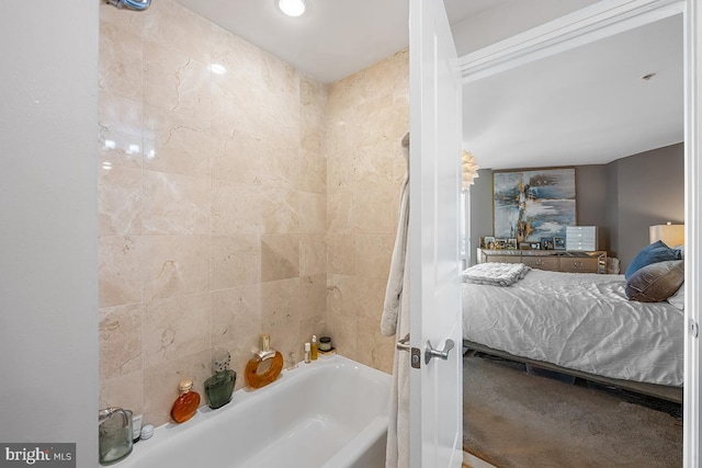 ensuite bathroom featuring tub / shower combination and connected bathroom