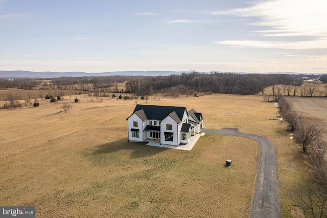 bird's eye view with a rural view and a mountain view