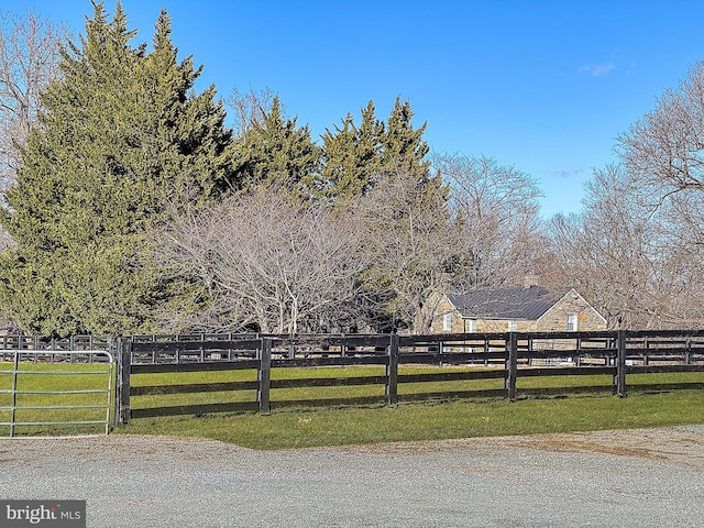 exterior space with a rural view