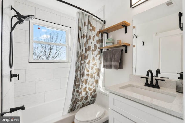 full bath featuring visible vents, shower / bath combination with curtain, vanity, and toilet