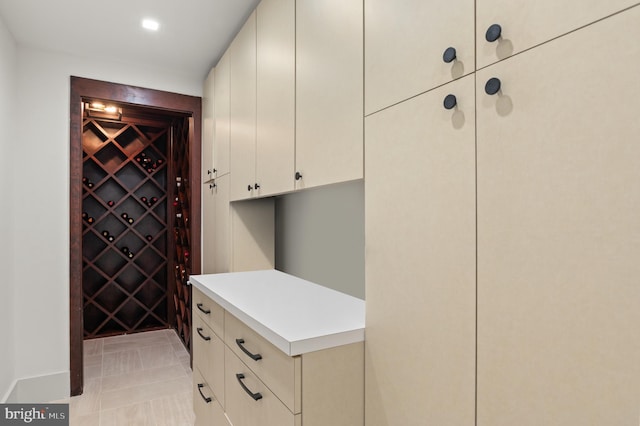 wine room featuring light tile patterned floors