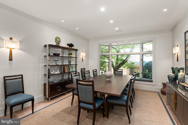 dining area featuring recessed lighting, light wood-style flooring, and baseboards