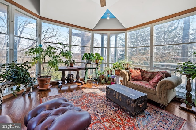 sunroom featuring lofted ceiling