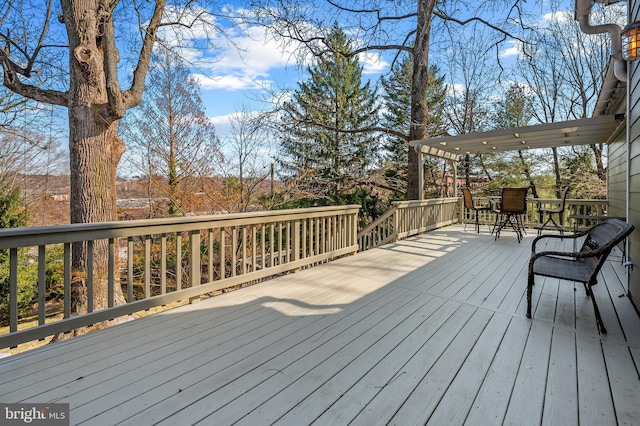 deck with outdoor dining space