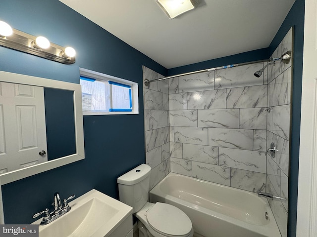 full bathroom featuring toilet, vanity, and shower / bathtub combination