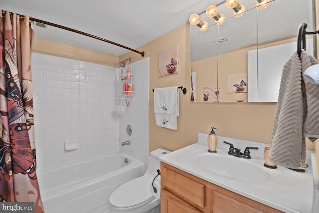 bathroom featuring toilet, shower / bathtub combination with curtain, and vanity