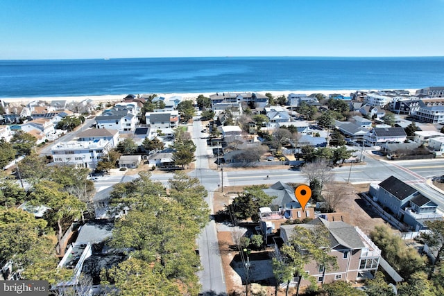 aerial view featuring a water view and a residential view