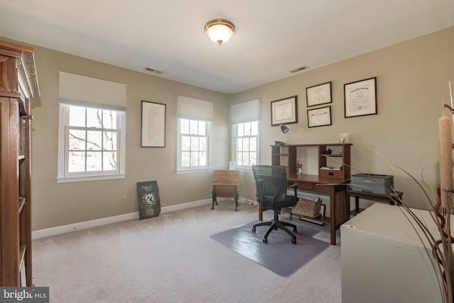 home office featuring baseboards, visible vents, and carpet flooring