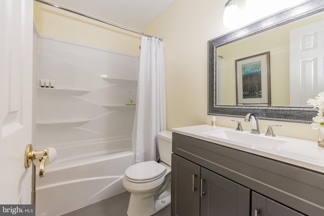 bathroom with shower / tub combo, vanity, and toilet