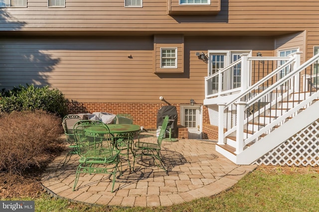 view of patio featuring stairway