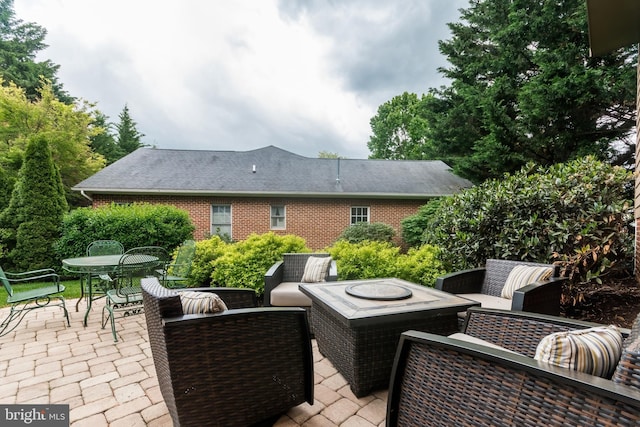view of patio / terrace with an outdoor hangout area and outdoor dining space