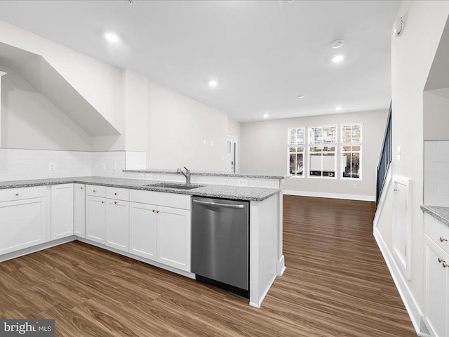 kitchen with dishwasher, open shelves, white cabinetry, and light stone countertops