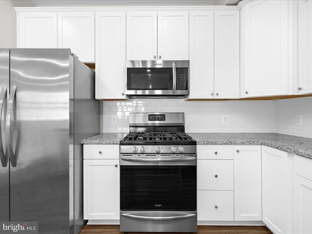 kitchen with white cabinets and stainless steel appliances