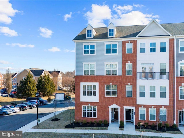 view of property with a residential view