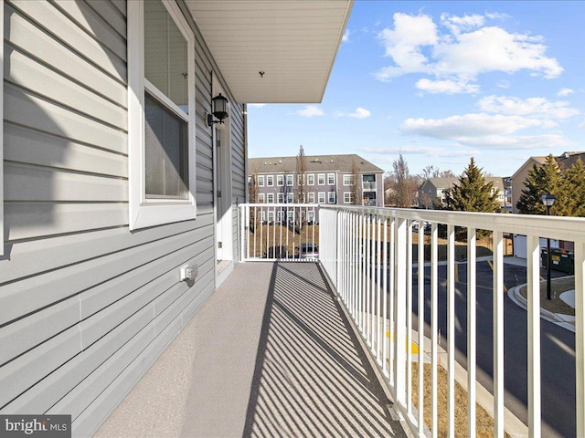 balcony featuring a residential view