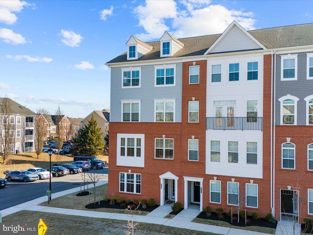 view of property with a residential view