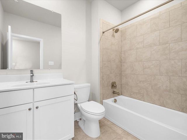 bathroom featuring shower / bath combination, tile patterned floors, toilet, and vanity