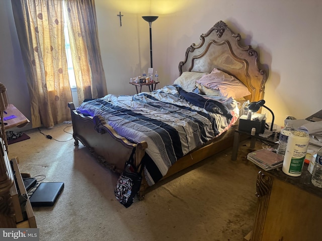 bedroom with light colored carpet