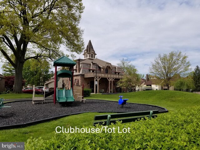 community play area with a yard
