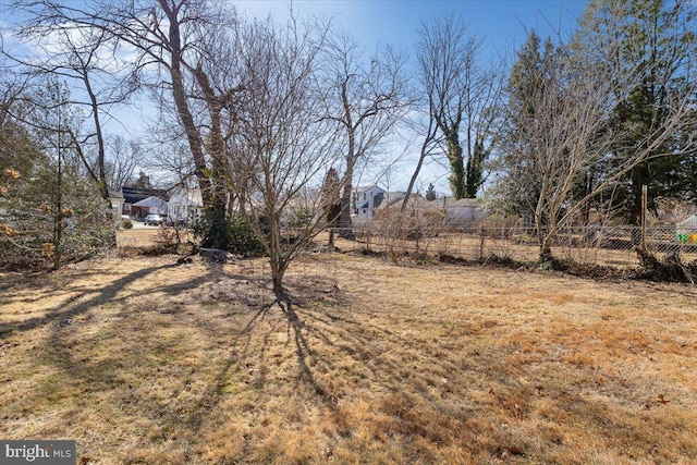 view of yard featuring fence