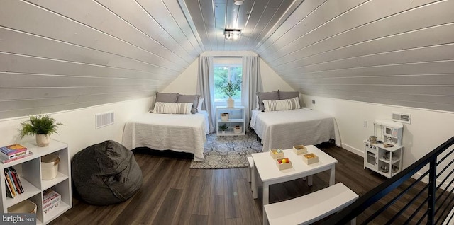 bedroom featuring lofted ceiling, dark wood-style floors, wood ceiling, and visible vents